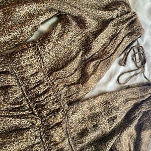 M short v neck in the front and back leopard dress.